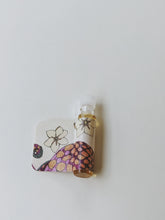 Load image into Gallery viewer, Octopus. natural perfume. kauai vetiver + petrichor. March 2023