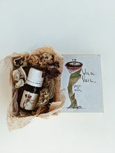 Load image into Gallery viewer, Venus in Mars ♀ natural perfume. bare thighs, hot saddle. civet, oud, tobacco. July 2024