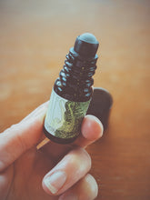 Load image into Gallery viewer, Huntress. natural perfume. wild herb garden, giant trees, green woods, wet earth. June 2023