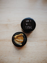 Load image into Gallery viewer, Castle. tarot perfume. deglet noor dates, saffron, pistachio, black roses, cardamom, chestnut, flint, stone, and mahogany. November 2024