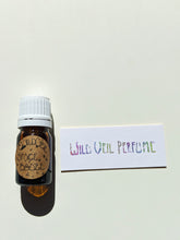 Load image into Gallery viewer, Space Booze. natural perfume. spicy, juicy, amber. December 2021