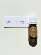 Load image into Gallery viewer, Space Booze. natural perfume. spicy, juicy, amber. December 2021