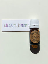 Load image into Gallery viewer, Space Booze. natural perfume. spicy, juicy, amber. December 2021