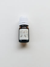 Load image into Gallery viewer, Hecate. natural perfume. heady, powerful smoke, herbs, amber, cedar. January 2023