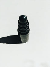Load image into Gallery viewer, Revenant. natural perfume. smoky leather and florals. July 2022