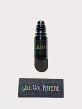 Load image into Gallery viewer, Space Booze. natural perfume. spicy, juicy, amber. December 2021