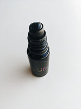 Load image into Gallery viewer, Patchouli Soliflore. natural perfume. chocolate foil wrapper, menthol, dinosaur dirt, tobacco, prehistoric mist, tar, swamp, paper, bittersweet cacao, root beer. August 2023