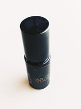 Load image into Gallery viewer, Narwhal. natural perfume. santal and cedrat nepal coated with beeswax. flotsam and brine. August 2020