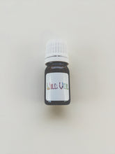 Load image into Gallery viewer, Revenant. natural perfume. smoky leather and florals. July 2022