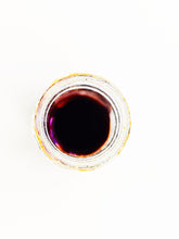 Load image into Gallery viewer, Space Booze. natural perfume. spicy, juicy, amber. December 2021