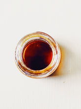 Load image into Gallery viewer, Gold Dust. natural perfume. sparkling red gold. saffron, amber. December 2022