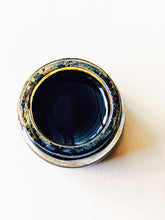 Load image into Gallery viewer, Octopus. natural perfume. kauai vetiver + petrichor. March 2023