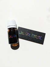 Load image into Gallery viewer, Black Cat. natural forest perfume. smoke, wild clove, lavender, frangipani, herbs, moss