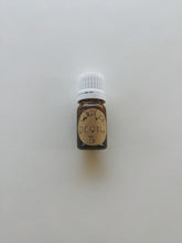 Load image into Gallery viewer, Devil. natural tarot perfume. goat fur, clover and herbs. clods of chocolatey truffle mud